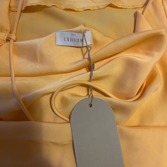 Meshki Chandra dress. Never worn with the tag on. Sold out online.Size:XXS - Picture 8 of 8